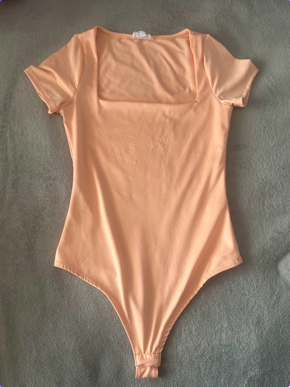 Peach bodysuit